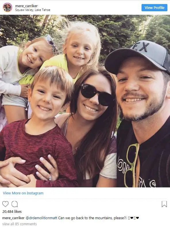 Carriker, his wife, Meredith Carriker, and their three children on a family...