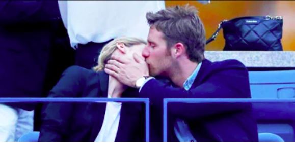 McDorman and Tipton share a kiss