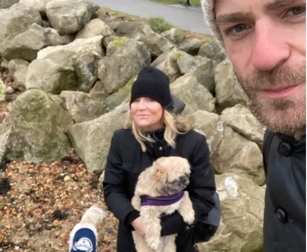 Michelle Collins with her boyfriend on a beach