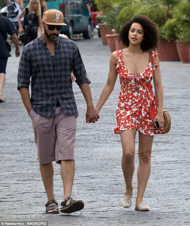 Emmanuel and Lanipekun seen holding hands in the street of Ischia, Italy. (Source: Newspress)