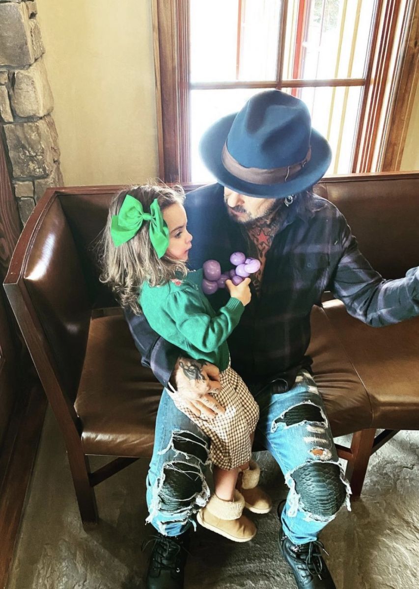 Dad Nikki Sixx with his daughter