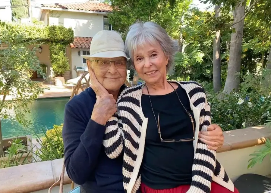 Rita Moreno posing with producer Norman Lear