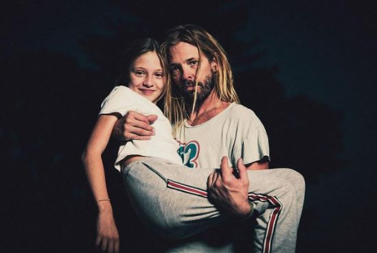 Taylor Hawkins with his middle child, daughter Annabelle in 2019.